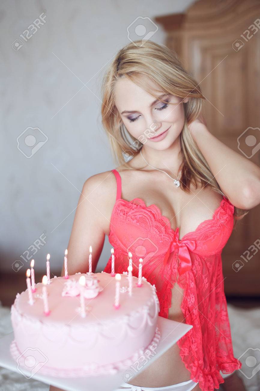 Sexy Blonde Woman In Lingerie With Birthday Cake Surprise Stock Photo Picture And Royalty Free Image Image