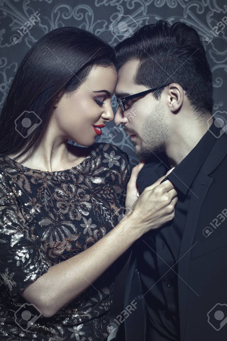 Sexy Woman Grab Smart Rich Man By Collar At Night, Seduction And Foreplay Stock Photo, Picture And Royalty Free Image