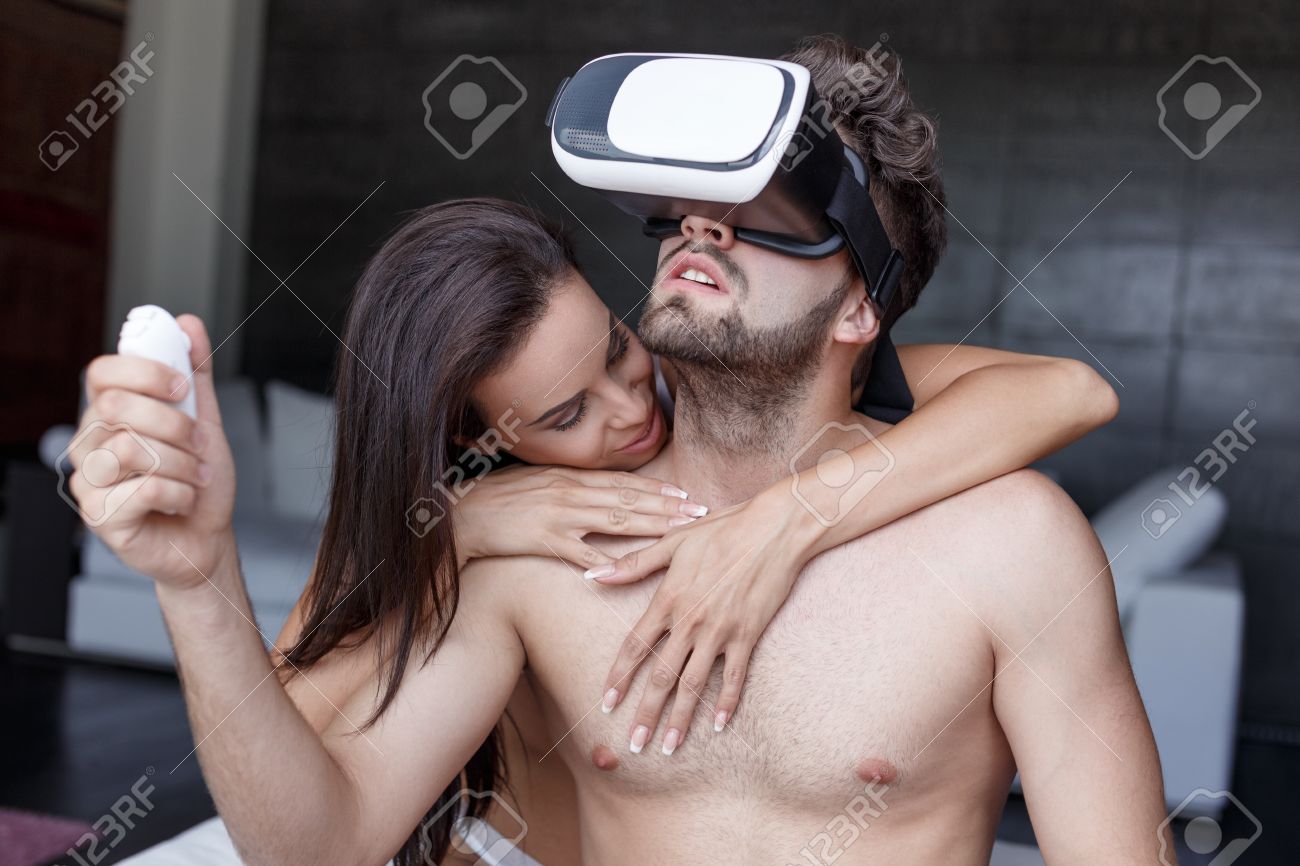 Naked Couple Playing Virtual Reality At