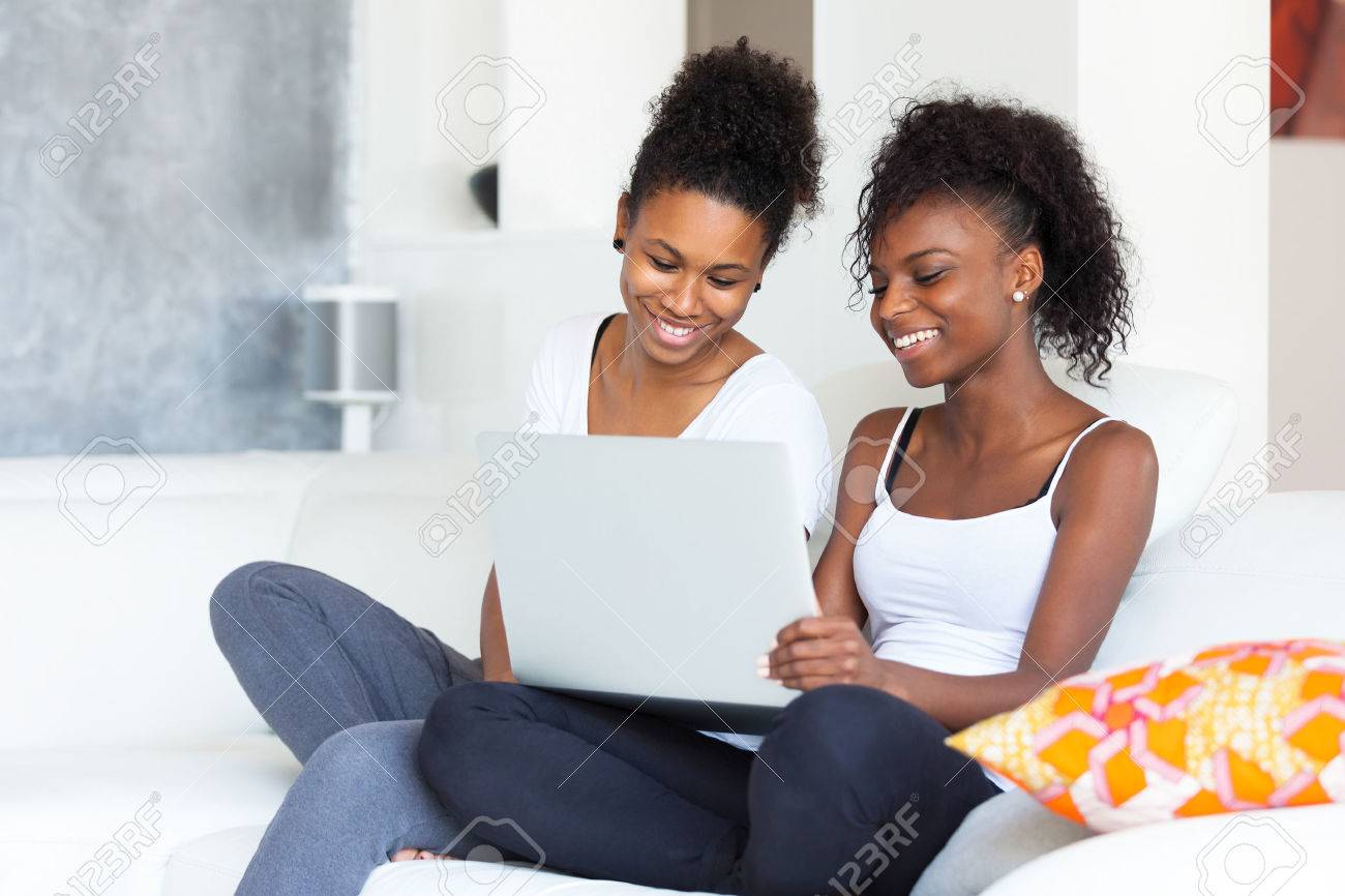 African American student girls using a laptop computer - black people - 46714038 African American student girls using a laptop computer - black people - 46714038