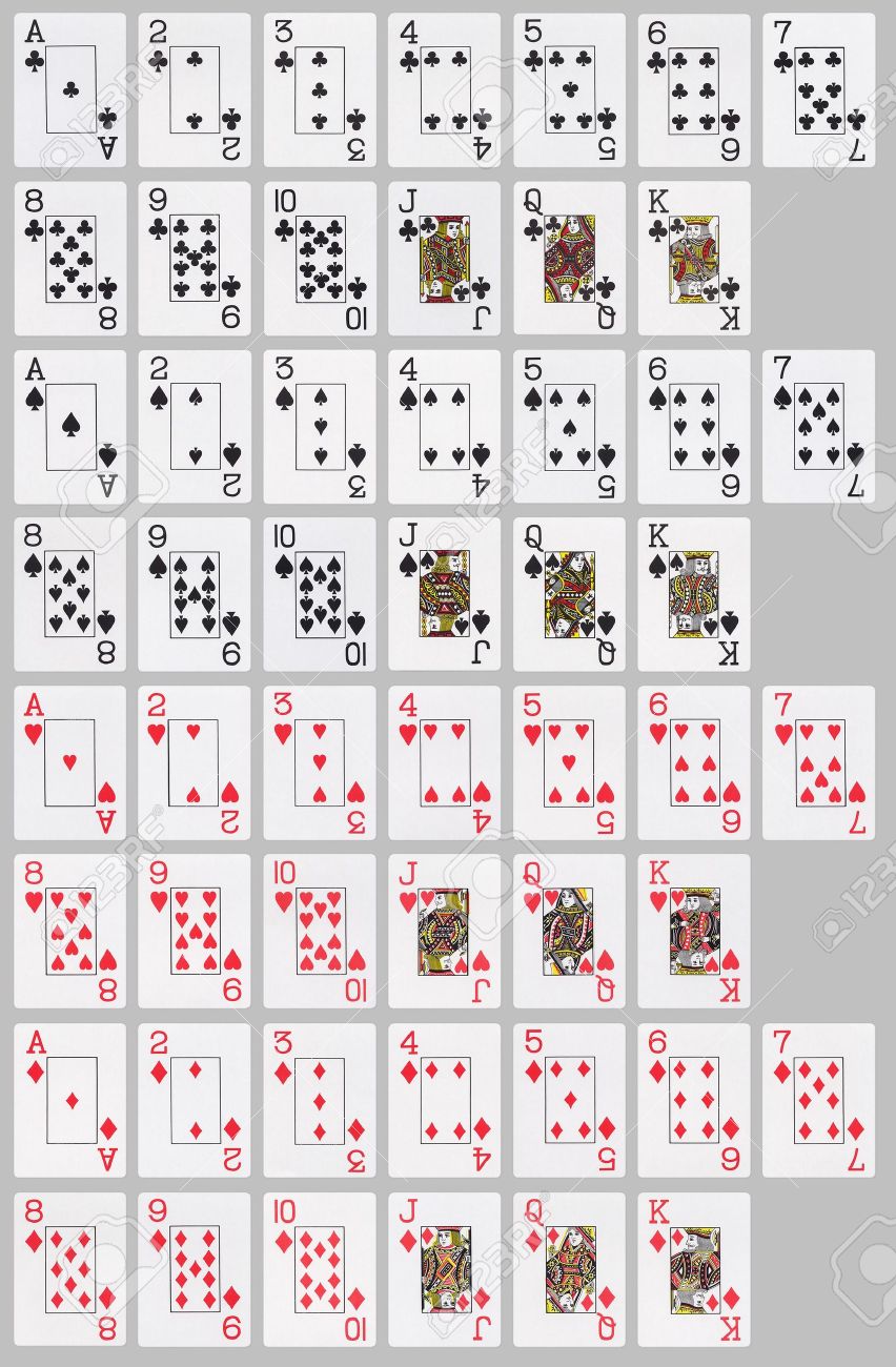 deck of 52 cards laid out on neutral grey background 52 cards