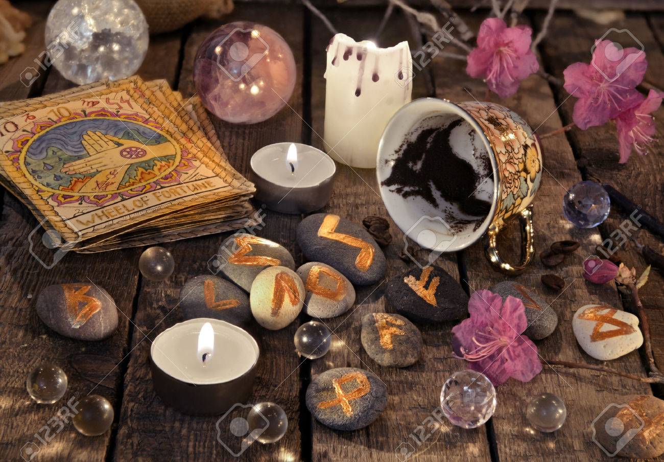 Mystic still life with coffee grounds, tarot cards and stone runes. Halloween background, coffee reading ritual, occult and esoteric objects on witch table - 78663788 Mystic still life with coffee grounds, tarot cards and stone runes. Halloween background, coffee reading ritual, occult and esoteric objects on witch table - 78663788
