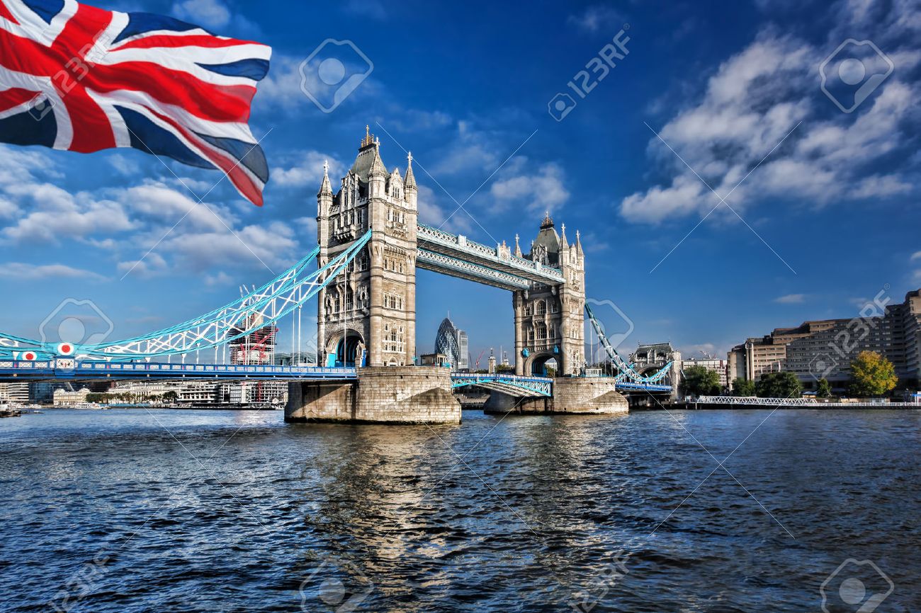 Famous Tower Bridge with flag of England in London, UK - 43879817 Famous Tower Bridge with flag of England in London, UK - 43879817