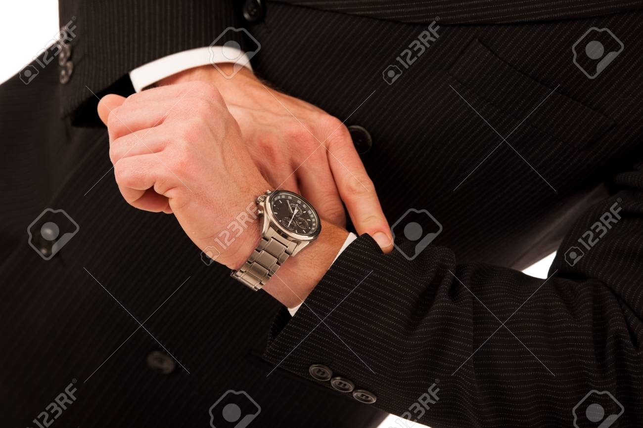 白で分離された腕時計でフォーマルなスーツ サイドロック時間で成功した実業家 の写真素材 画像素材 Image