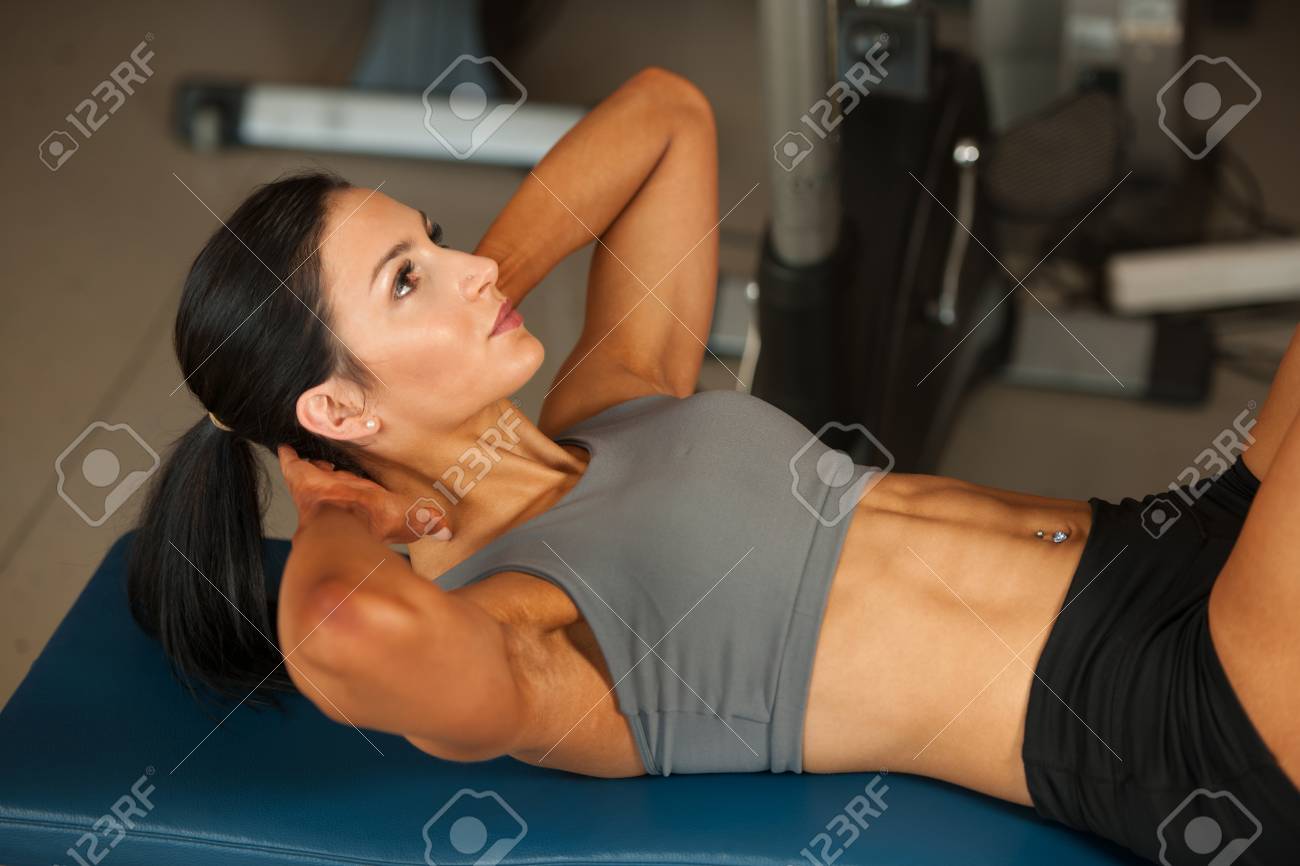 Beautiful Young Fit Woman Workout Abdominal Muscles Abs In Fitness Stock Photo Picture And Royalty Free Image Image