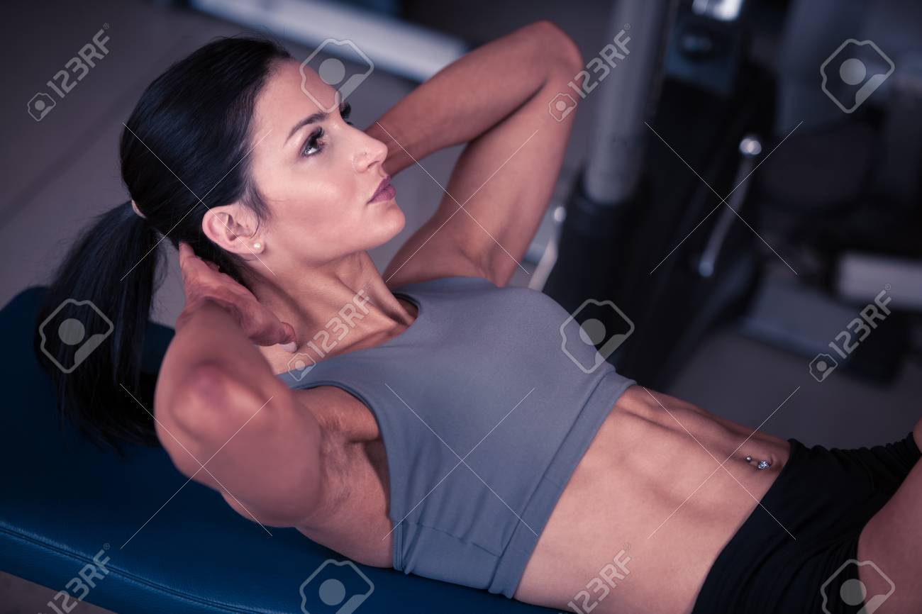 Beautiful Young Fit Woman Workout Abdominal Muscles Abs In Fitness Stock Photo Picture And Royalty Free Image Image