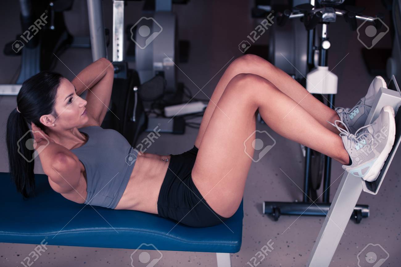Beautiful Young Fit Woman Workout Abdominal Muscles Abs In Fitness Stock Photo Picture And Royalty Free Image Image 9076