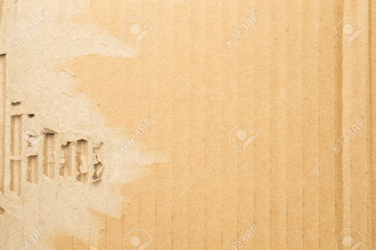 破れた引き裂かれた段ボール紙、段ボールのテクスチャ背景 の写真素材 