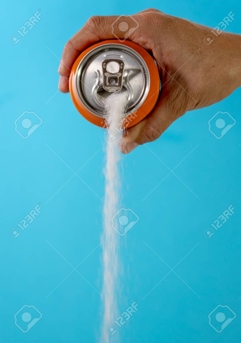 hand holding soda can pouring lots of sugar in metaphor of sugar