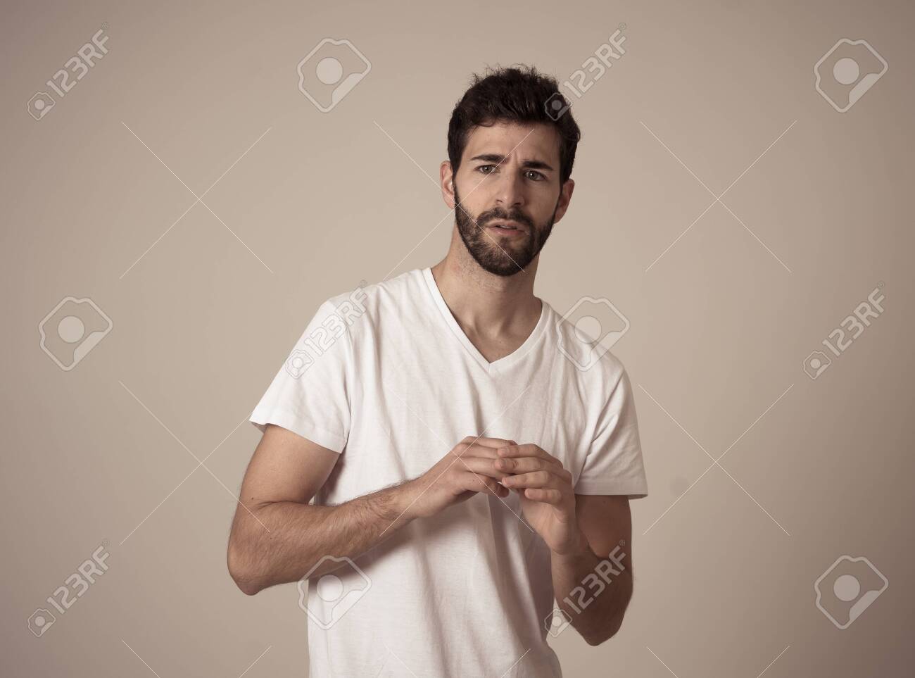 Portrait Of Young Man In Shock With A Scared Face Expression