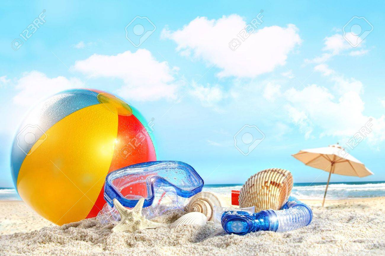 Fun day at the beach with goggles and beach ball - 9591765 Fun day at the beach with goggles and beach ball - 9591765