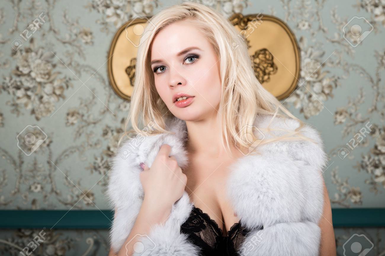 Lingerie And White Fur Coat Posing