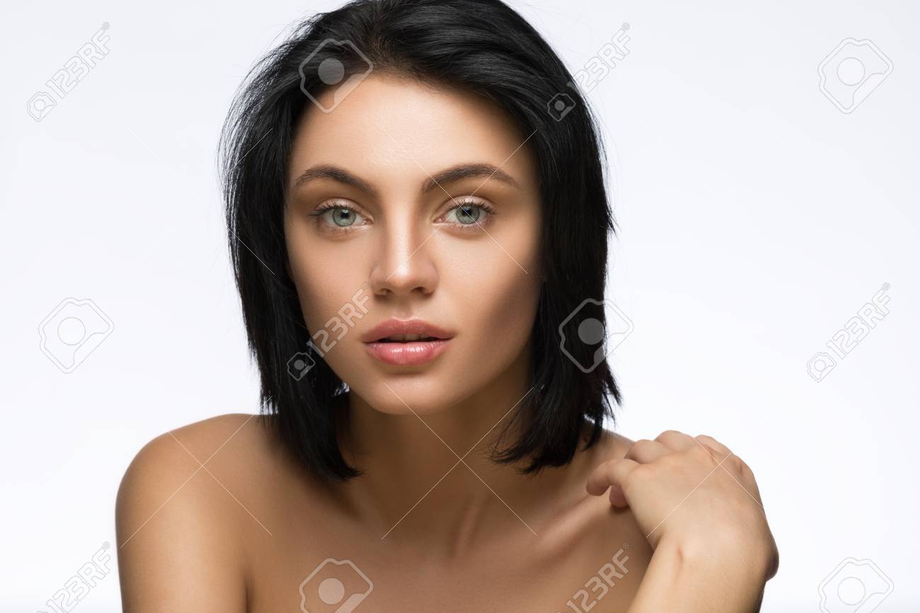 Beautiful Young Woman With Straight Short Hair Isolated On White