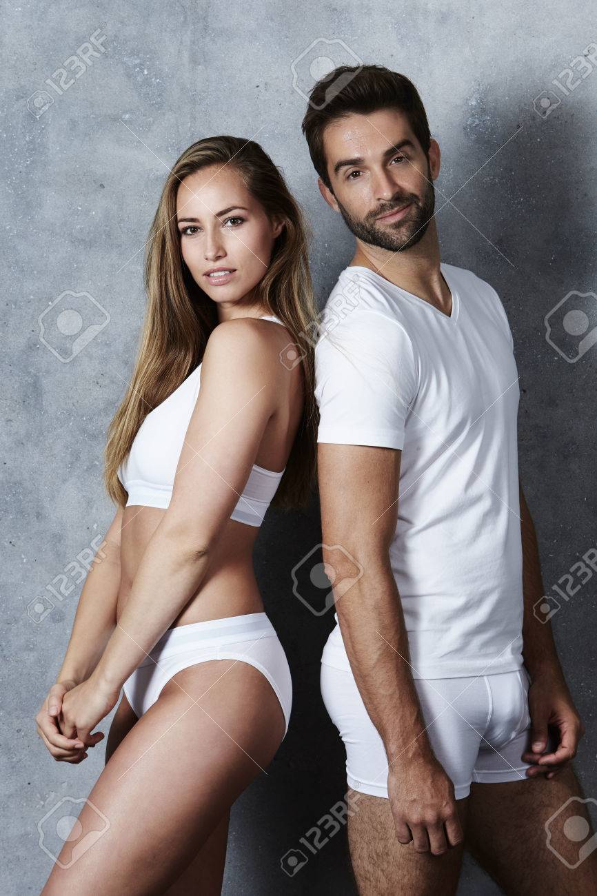 Handsome Couple Undressed Looking At Camera Stock Photo, Picture and  Royalty Free Image. Image 65637633.