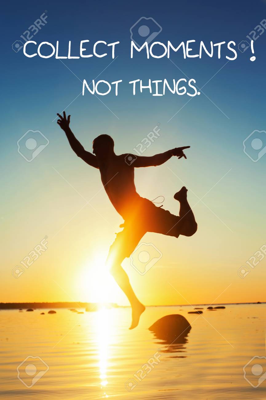 Collect Moments, Not Things. Inspirational Motivation Quote With Funny Jumping Man On Summer Beach Sunset Background In Rays Of Sunlight. Multicolored Vibrant Vertical Outdoors Image. Vintage Filter Stock Photo, Picture And Royalty Collect Moments, Not Things. Inspirational Motivation Quote With Funny Jumping Man On Summer Beach Sunset Background In Rays Of Sunlight. Multicolored Vibrant Vertical Outdoors Image. Vintage Filter Stock Photo, Picture And Royalty