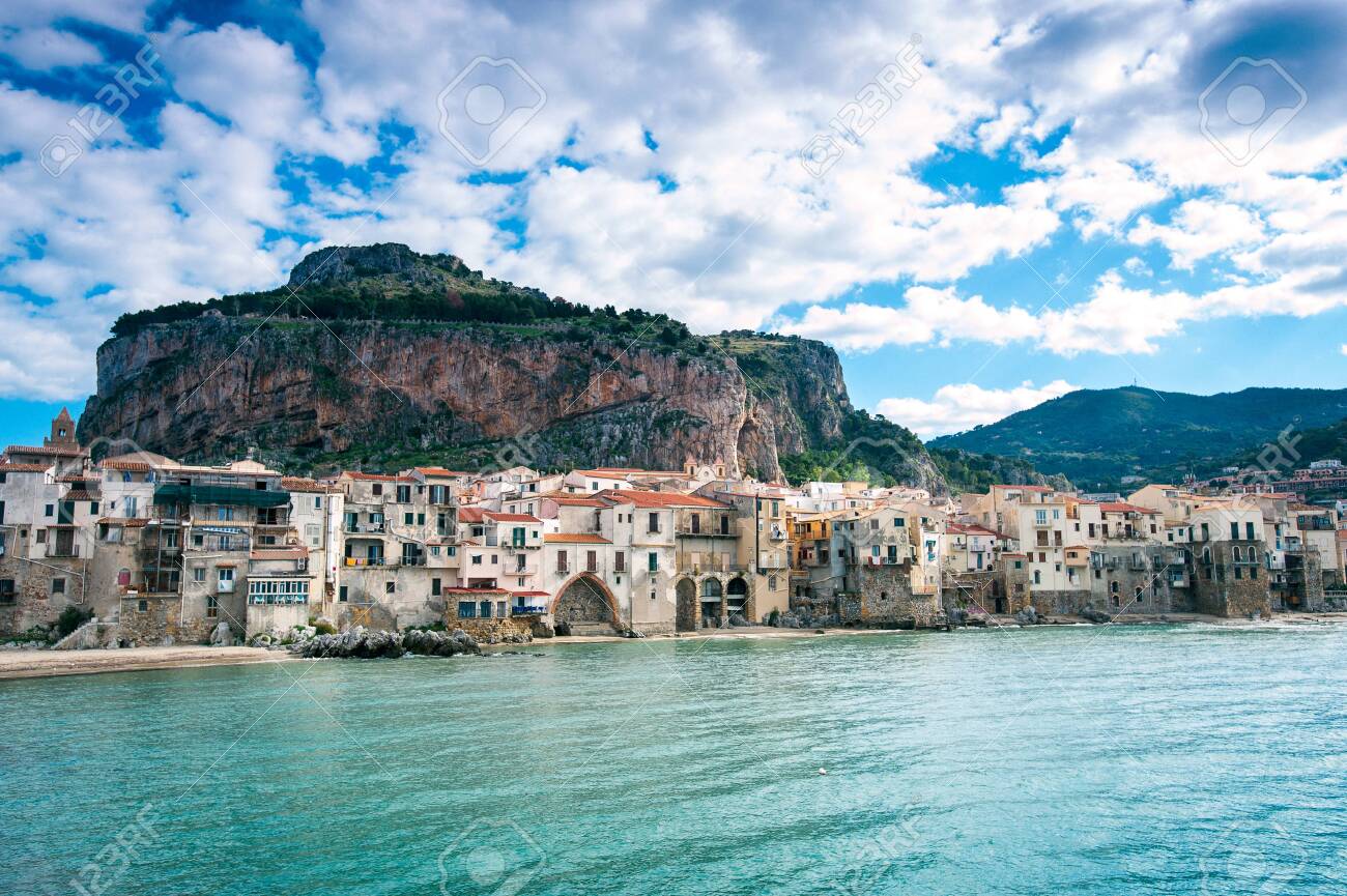 Cefalu, Sicily. Ligurian Sea And Cityscape Of Sunny Old Medieval Sicilian  Town. Province Of Palermo, Italy. Summertime Outdoors Horizontal Image With  Filter. Panoramic View From Seaside Stock Photo, Picture and Royalty Free, image size:1300x865