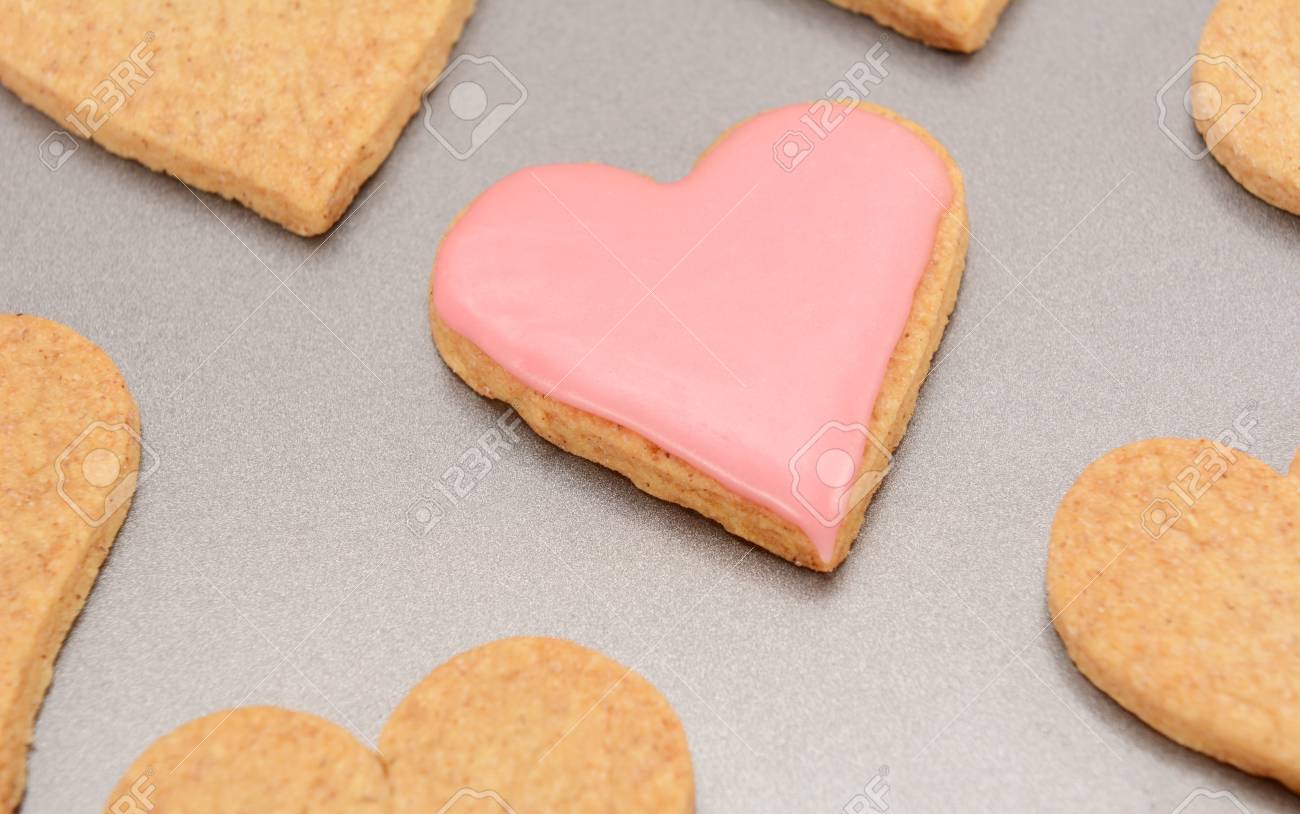 close up of an iced heart shaped biscuit for valentines day stock heart shaped cookie sheet