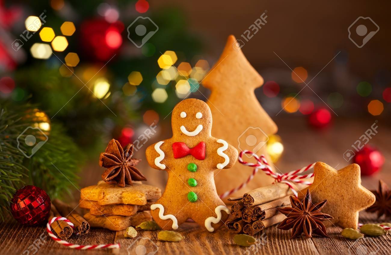 Christmas homemade gingerbread cookies and spices on the wooden background - 87322926 Christmas homemade gingerbread cookies and spices on the wooden background - 87322926