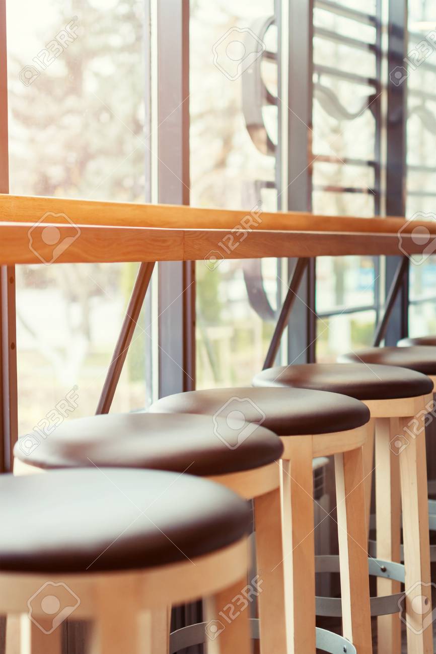 Seats In A Cafe Bar Stools Stand In A Row Along The Window In Stock Photo