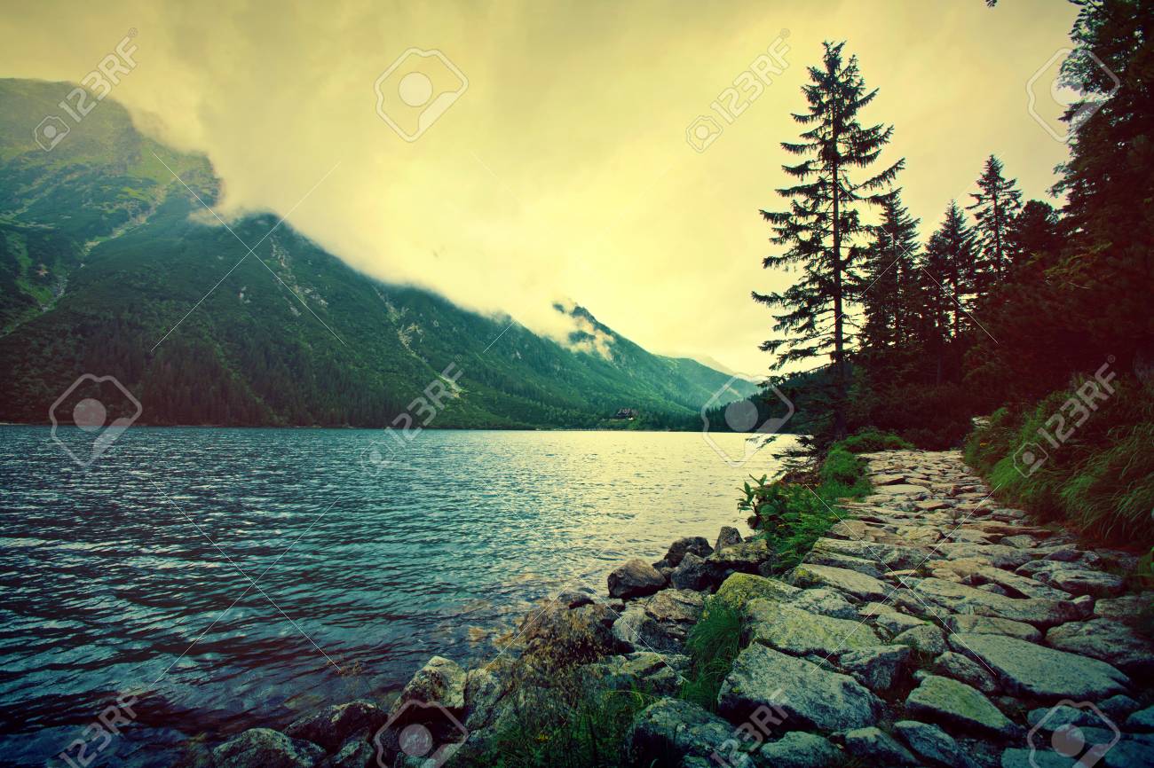 Lake In Mountains Fantasy And Colorfull Nature Landscape Retro Stock Photo Picture And Royalty Free Image Image 84491116