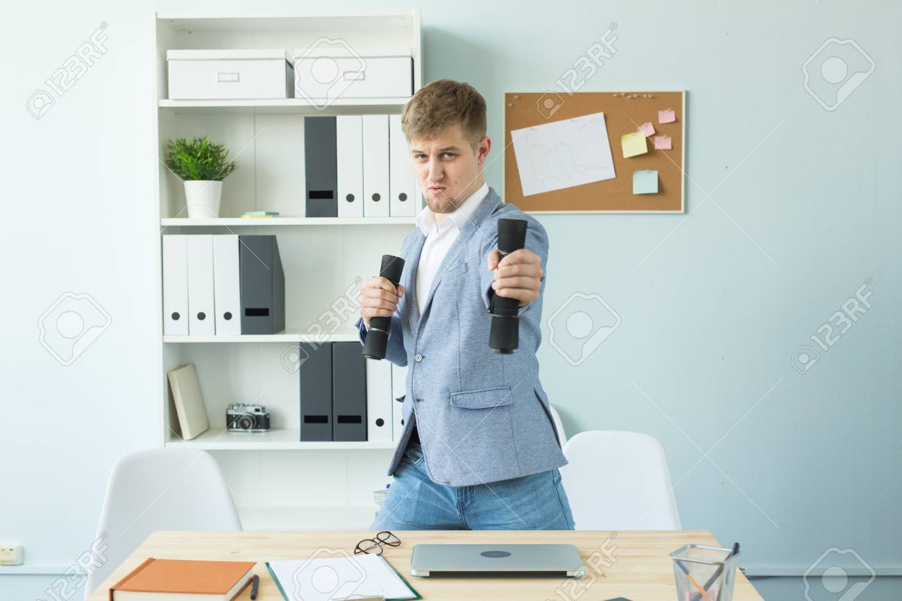 office fitness and people concept business man working and doing fitness office