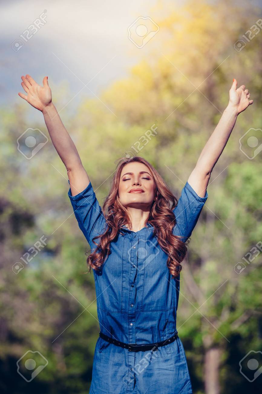 Free Happy Woman Enjoying Nature. Beauty Girl Outdoor. Freedom concept. Beauty Girl over Sky and Sun. Sunbeams. Enjoyment. - 39887807 Free Happy Woman Enjoying Nature. Beauty Girl Outdoor. Freedom concept. Beauty Girl over Sky and Sun. Sunbeams. Enjoyment. - 39887807
