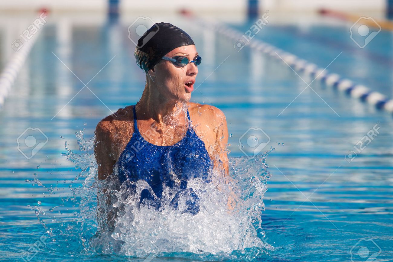 professional swimmer, water splashing, goggles and swimming cap - 40854872 professional swimmer, water splashing, goggles and swimming cap - 40854872