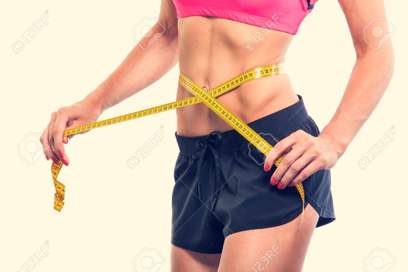 Weight losing - measuring woman's body, isolated centimeter - 43575880 Weight losing - measuring woman's body, isolated centimeter - 43575880