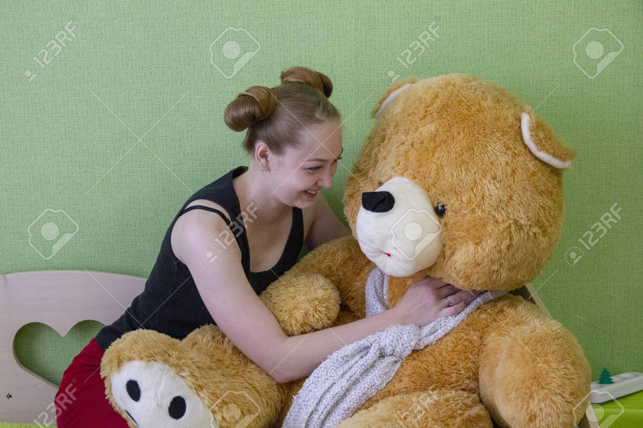 girl with a teddy