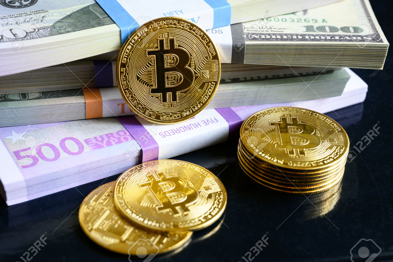 Bitcoin And Money Stacks, Much Of Euro And US Dollar Bills And Gold Bit  Coins. Digital Virtual Crypto Currency Bitcoin Btc With Cash Pile. Concept  Of Bitcoin Online Payment, Business And Banking.