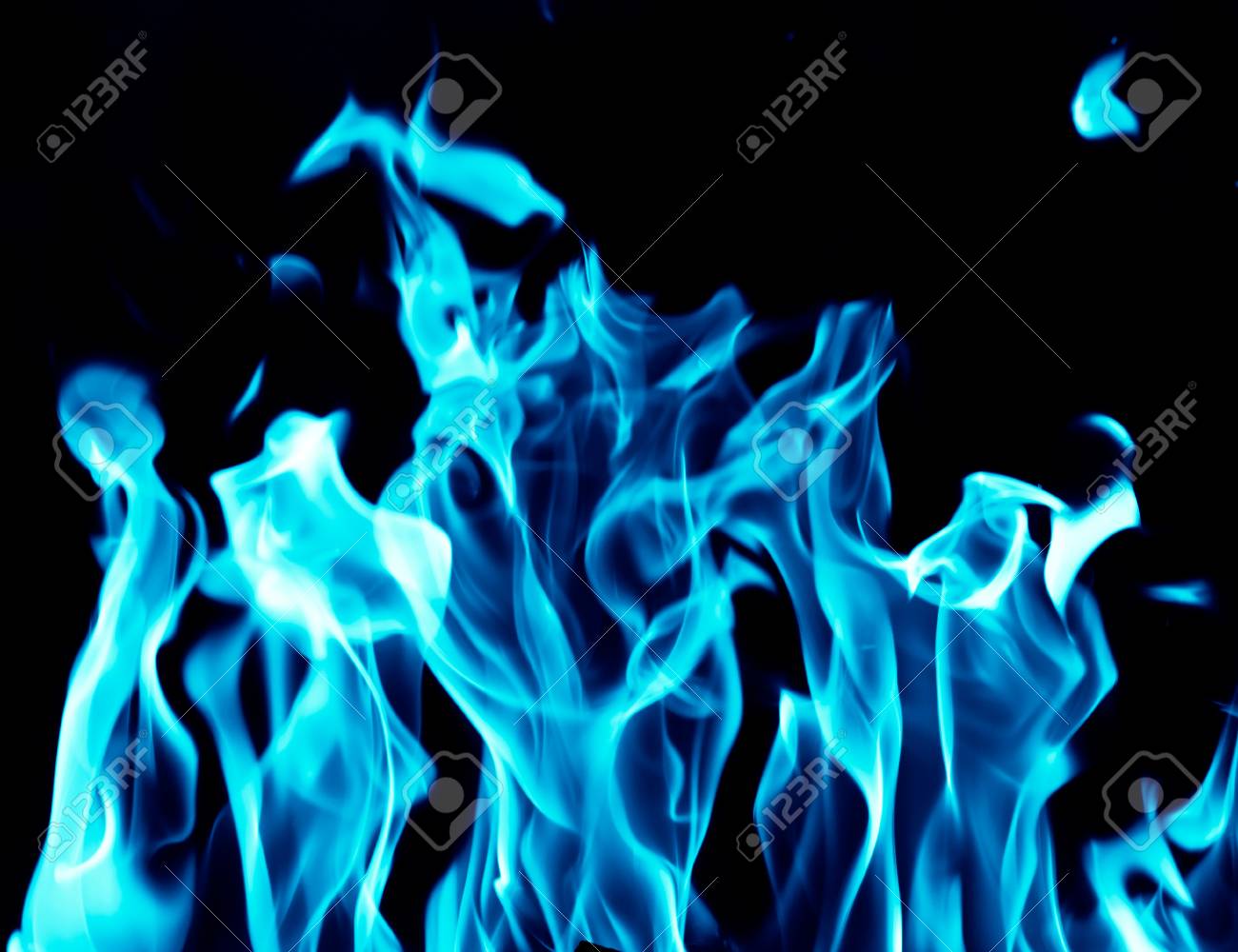 Blue Flames On A Black Background Stock Photo Picture And Royalty Free Image Image