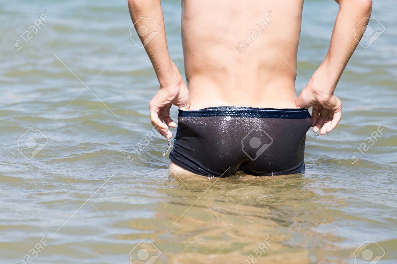 gay teen boys butts Ass Boy In The Lake On The Beach Stock Photo, Picture and Royalty Free  Image. Image 67886874.