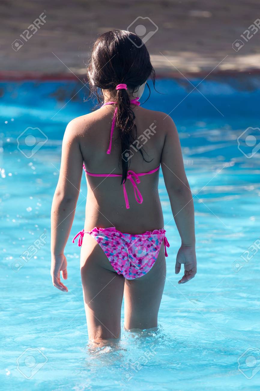 Girl Bathes In The Water Park Stock Photo, Picture and Royalty Free Image.  Image 68258594.