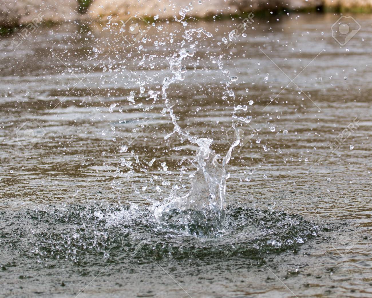 Water Splashing From A Stone In The River Stock Photo Picture And Royalty Free Image Image 76196659