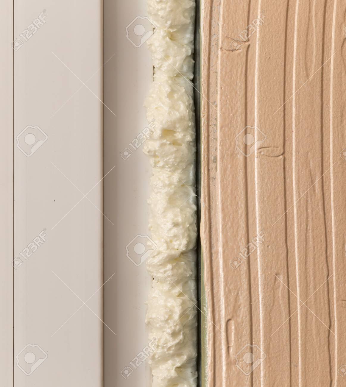 Fixing The Gap In The Door With Construction Foam