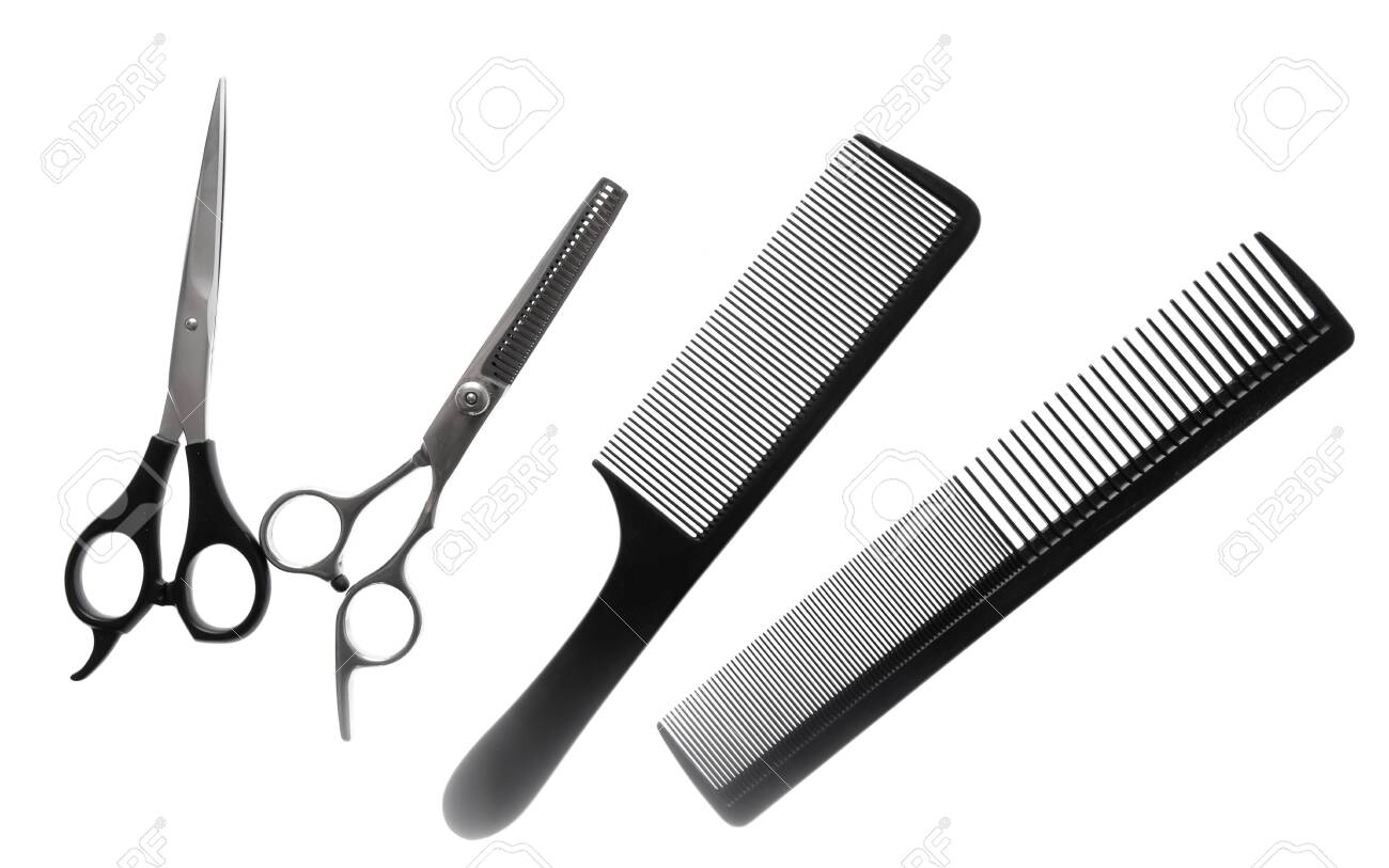 cutting hair with scissors and comb