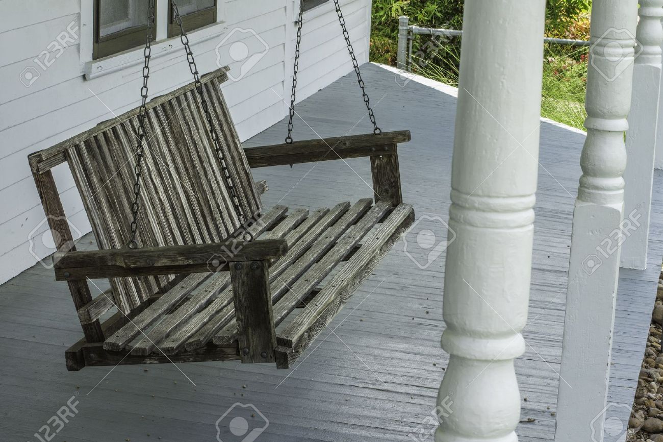 Old Wooden Porch Swing Hanging On A Front Porch Of An Old Home Stock Photo, Picture And Royalty Free Image. Image 20929701.