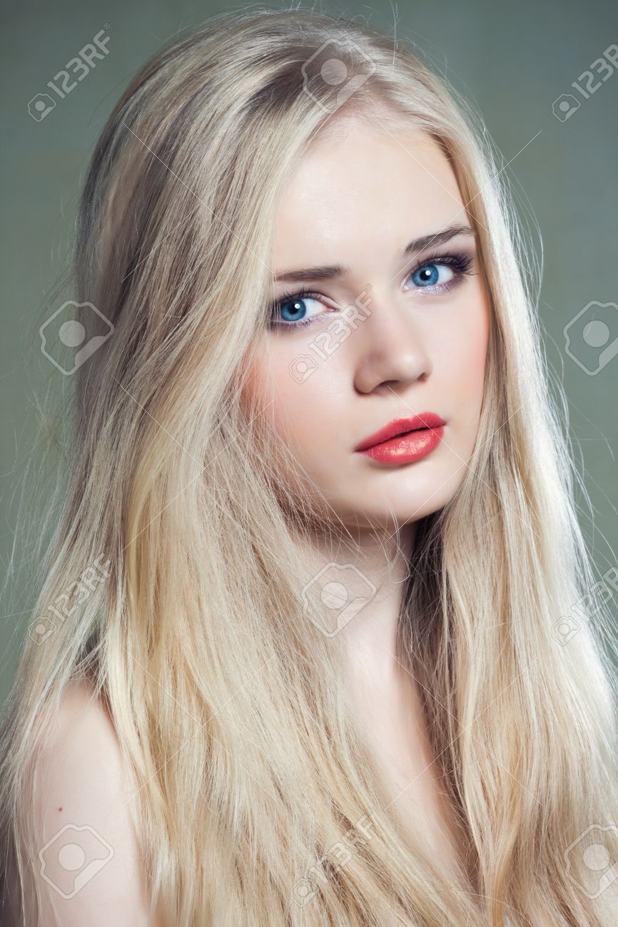 Beautiful Girl With Blue Eyes And Long Blonde Hair Stock Photo