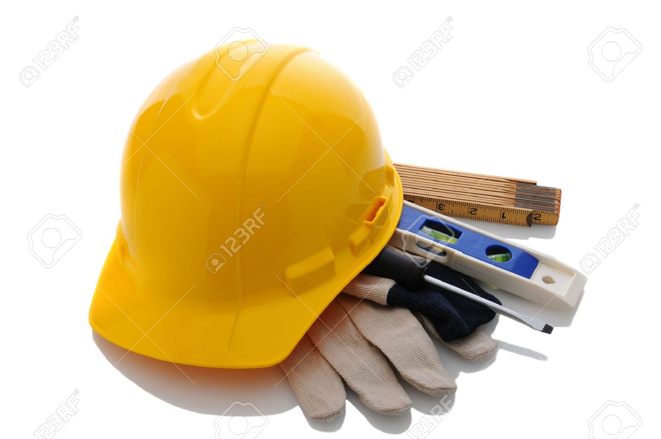 a yellow contractors hard hat on work gloves and tools horizontal hat format
