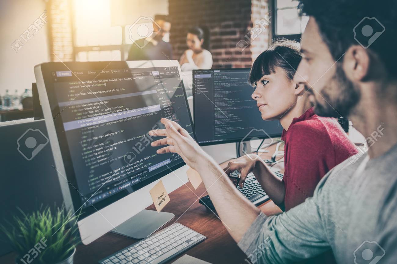 Developing programming and coding technologies. Website design. Programmer working in a software develop company office. - 96050752 Developing programming and coding technologies. Website design. Programmer working in a software develop company office. - 96050752