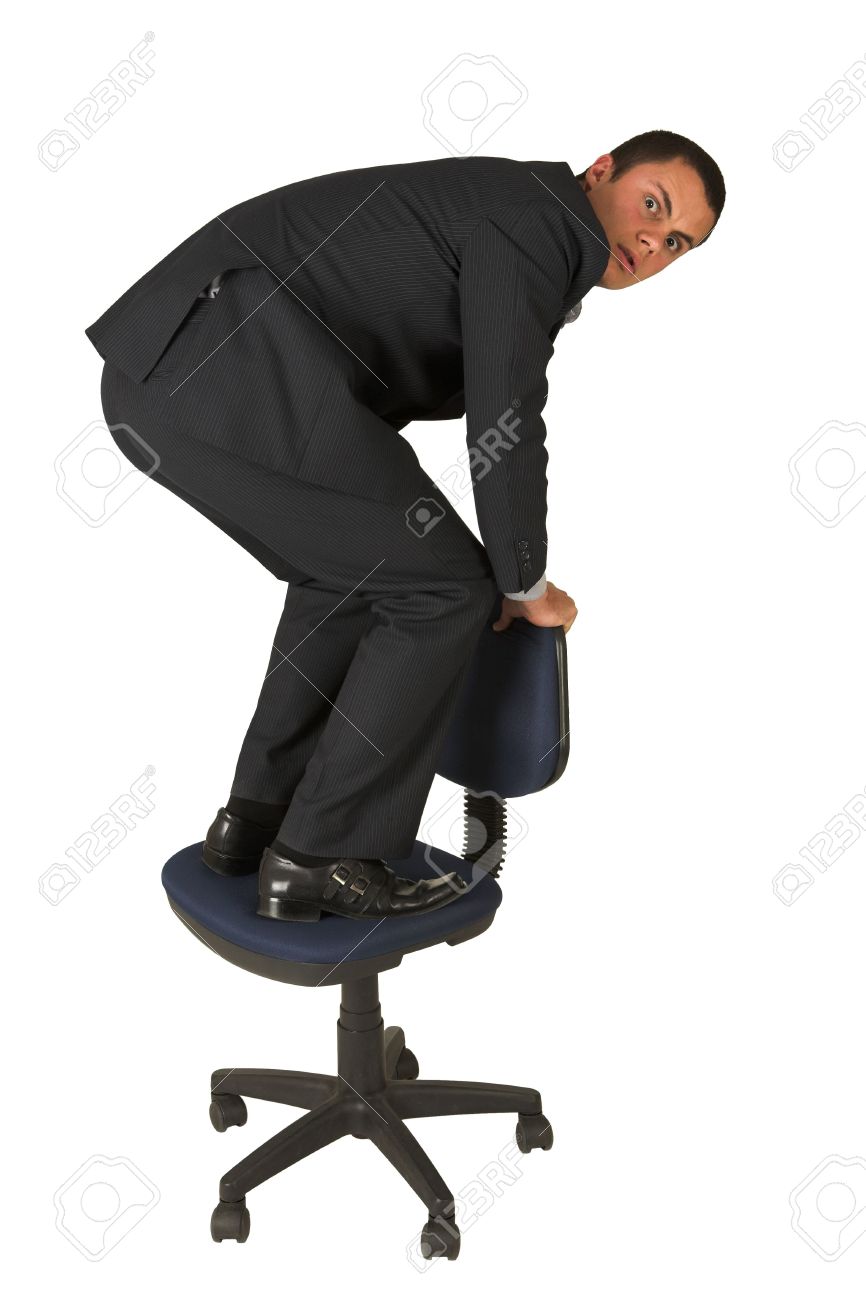 businessman wearing a suit and a grey shirt. standing on an businessman wearing a suit and a grey shirt. standing on an