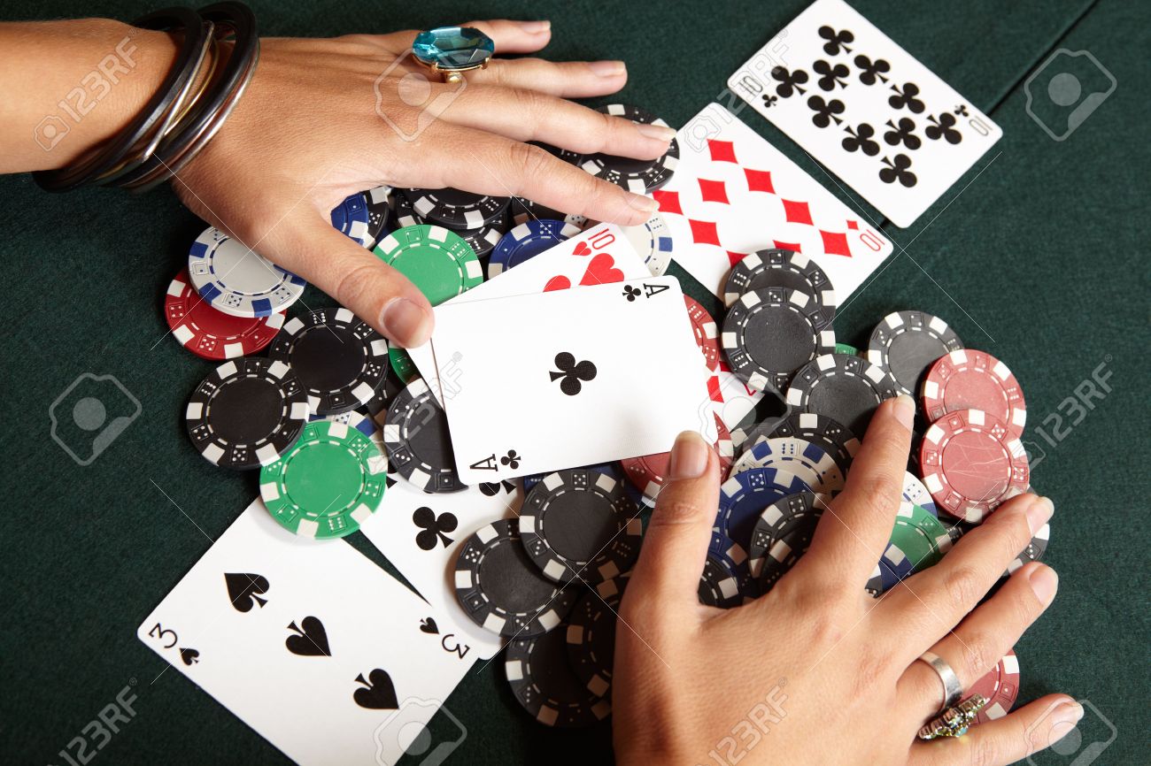 Winning Hand Three Of A Kind Aces High Playing Cards Chips And Player Pulling Winnings To Herself On A Green Felt Poker Table Stock Photo Picture And Royalty Free Image Image 4720694