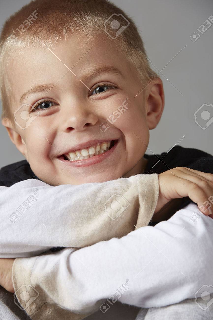 5 Year Old Caucasian Boy With Short Blonde Hair Blue Eyes And