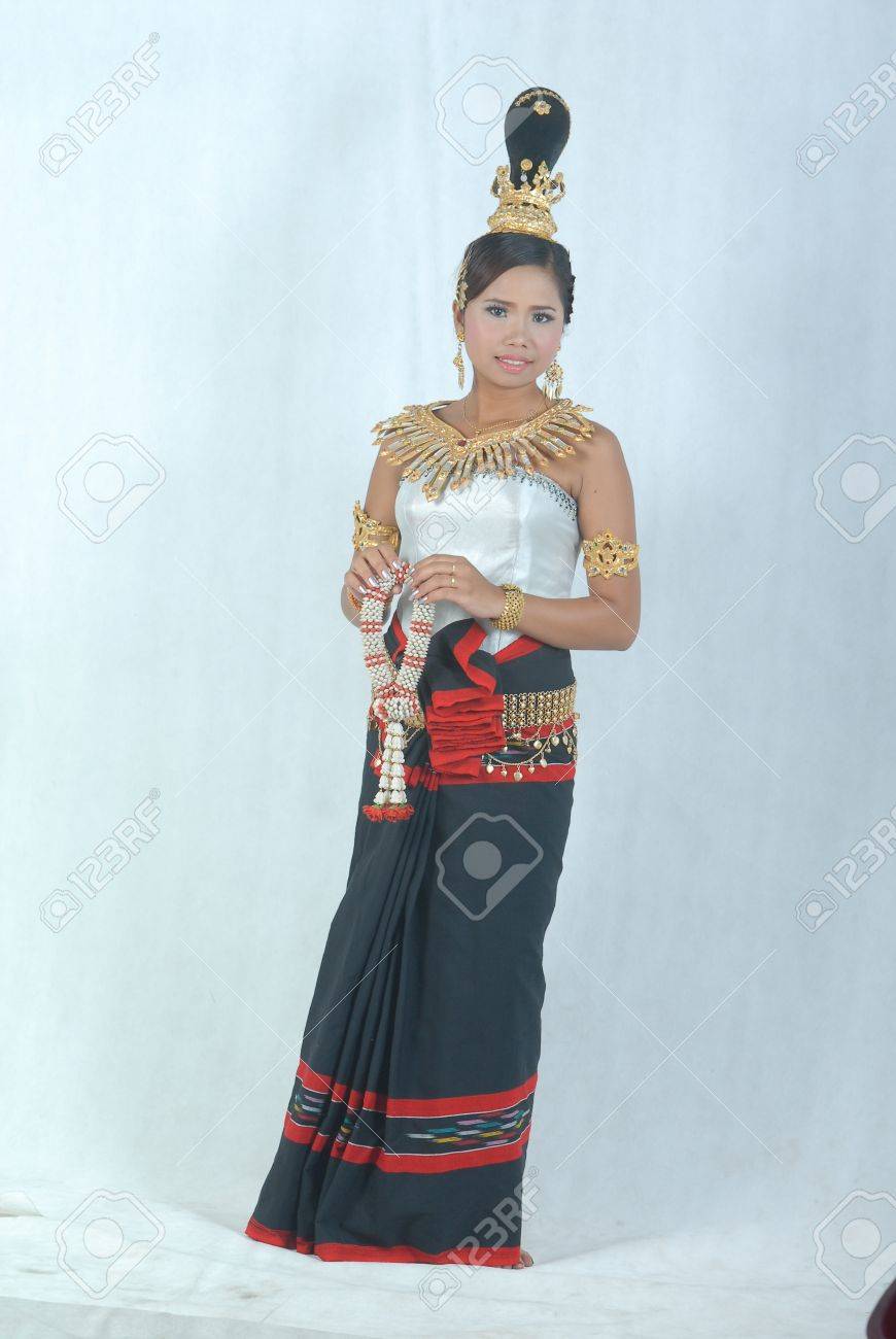A Cambodian (Khmer) girl dressed in Cambodian custom/tradition. It - 10669722 A Cambodian (Khmer) girl dressed in Cambodian custom/tradition. It - 10669722