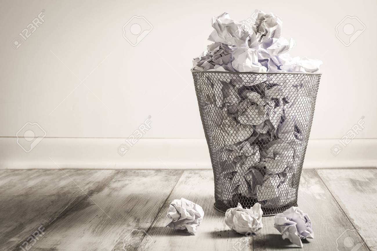Crumpled Paper In The Trash Can Stock Photo, Picture and Royalty Free  Image. Image 60917061.