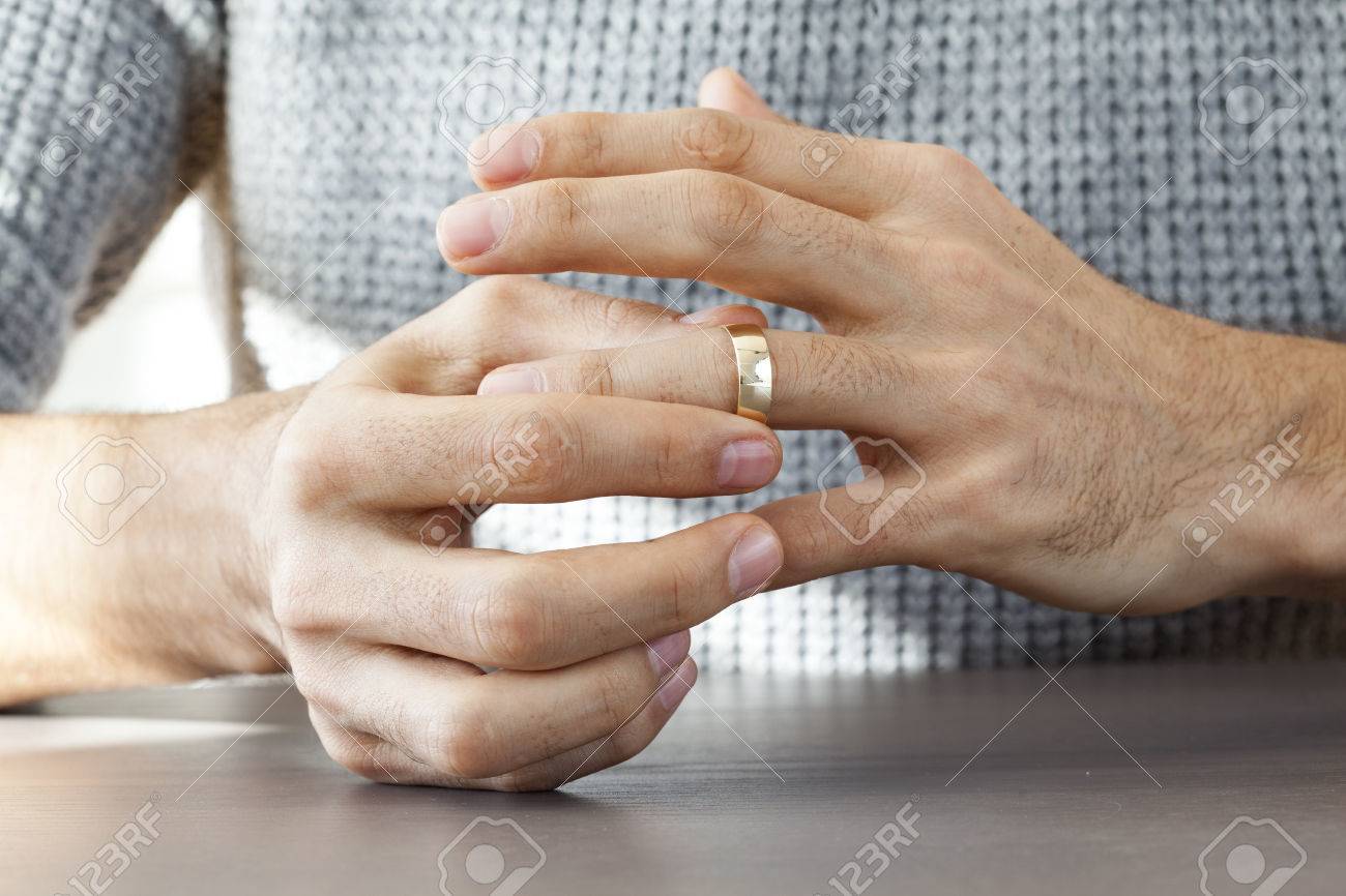 Man Taking Off Wedding Ring Stock Photo Picture And Royalty Free Image Image 70803763 Man Taking Off Wedding Ring Stock Photo Picture And Royalty Free Image Image 70803763