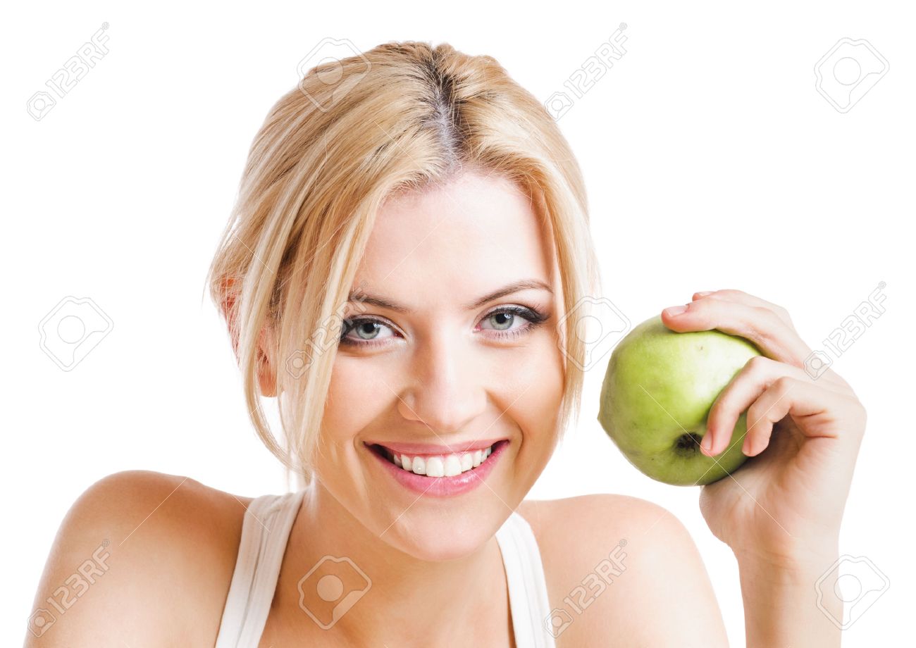 blond woman with green apple. - 33062352 blond woman with green apple. - 33062352