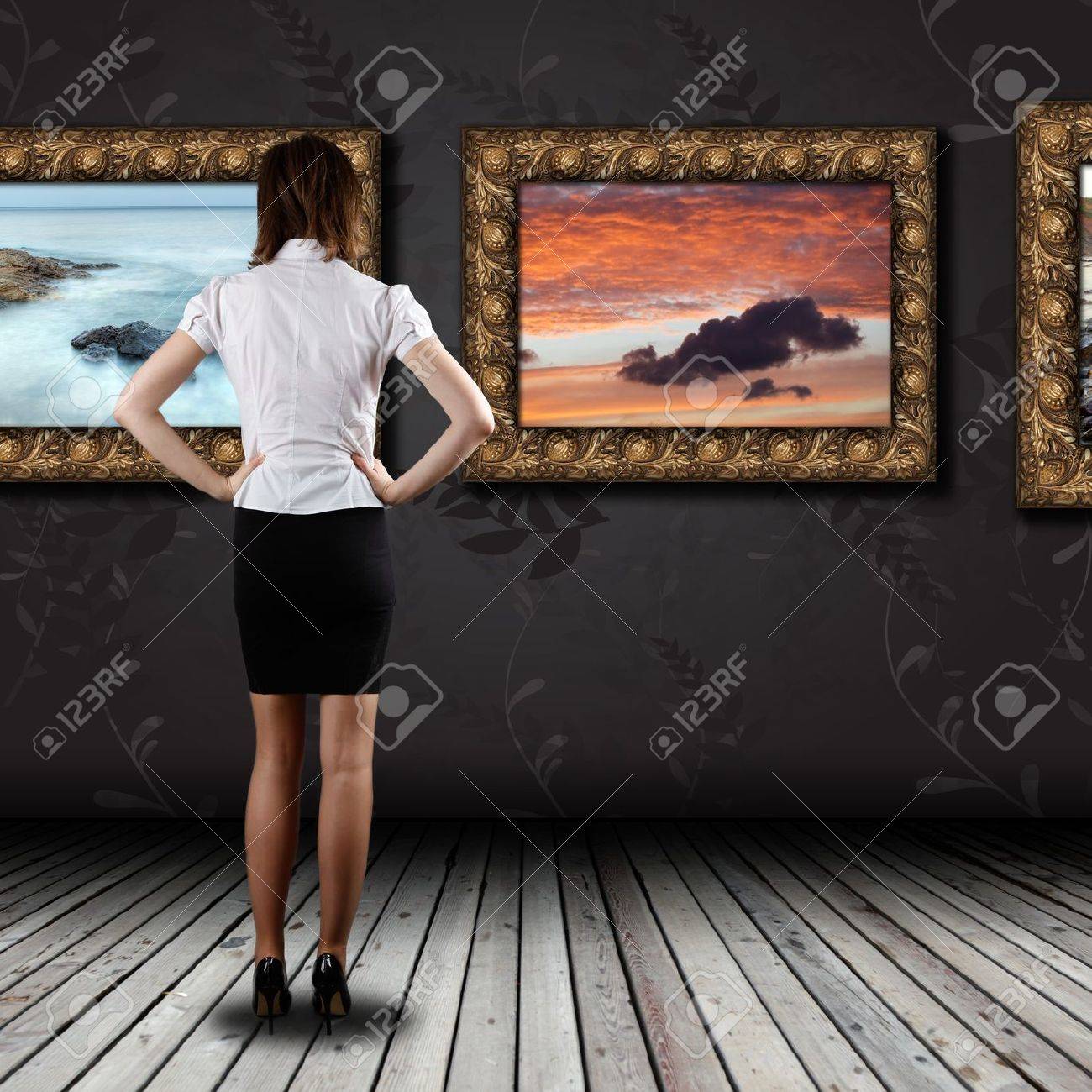 Woman standing in the gallery and watching art - 20014271 Woman standing in the gallery and watching art - 20014271