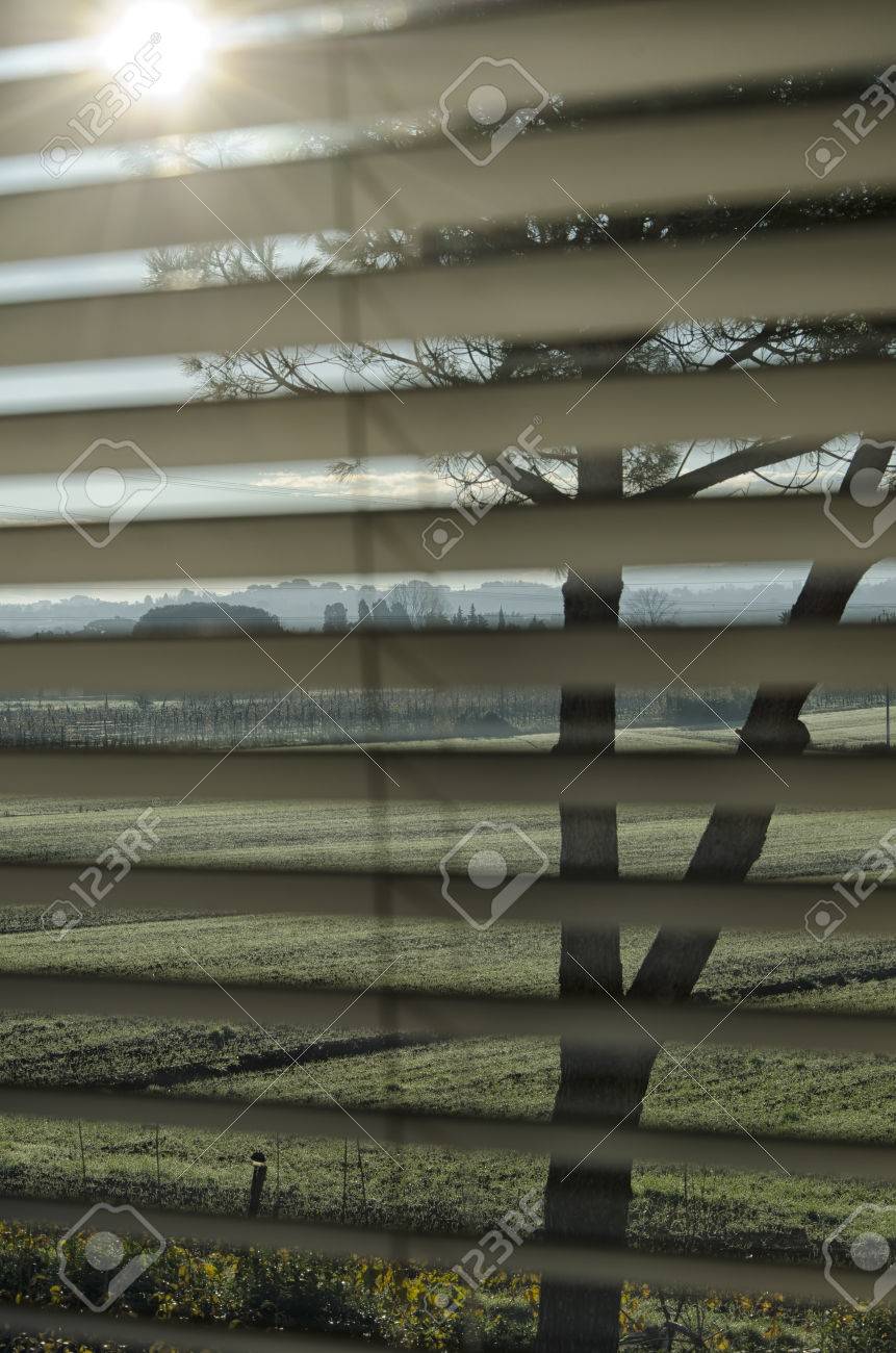 persian blinds which lets pass the sunbeam stock photo picture and