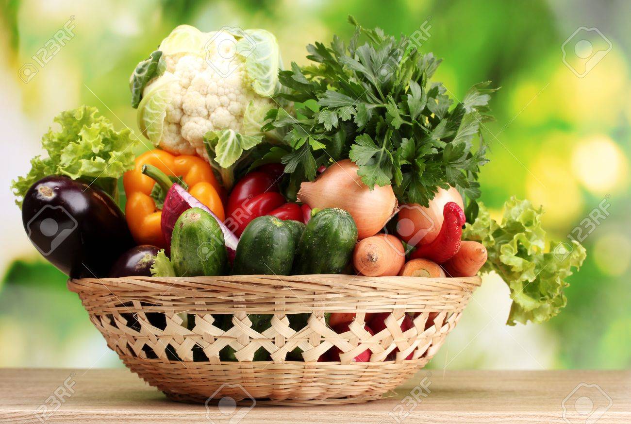 Fresh Vegetables In Basket On Wooden Table On Green Background Stock Photo,  Picture and Royalty Free Image. Image 11912013., image size:1300x873